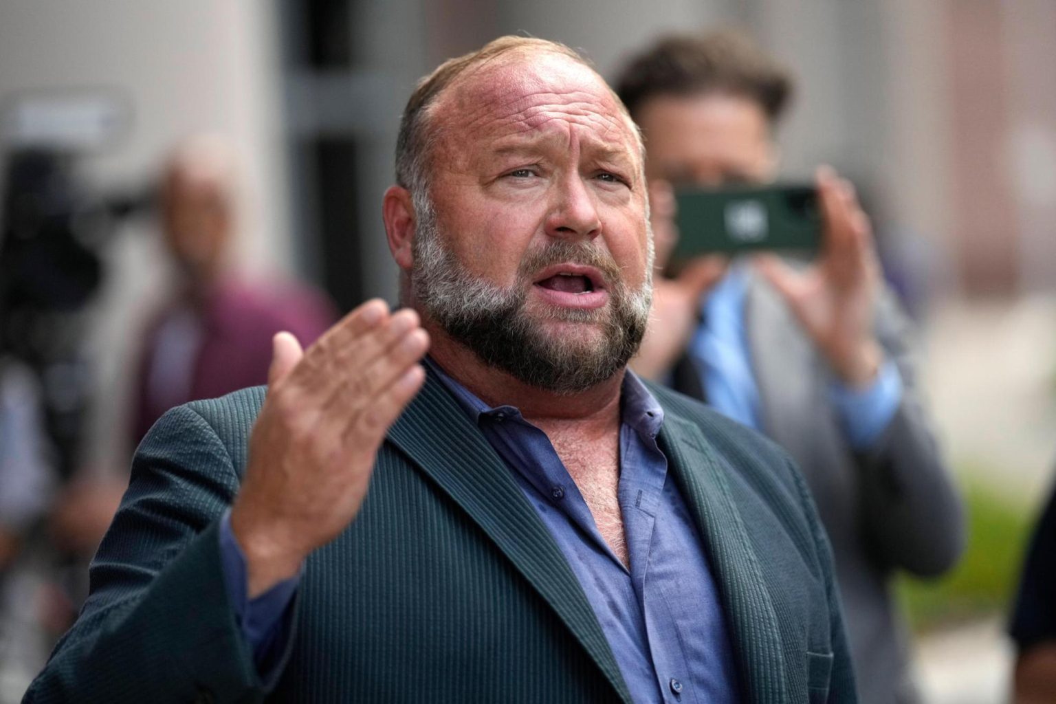 Court slashes $50M judgment against Alex Jones over false claims