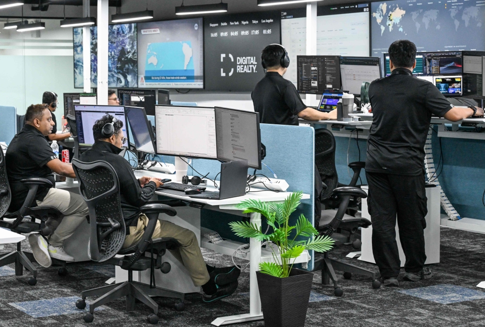 Singapore hub battles typhoon alerts, overheating servers and false alarms to keep AI alive